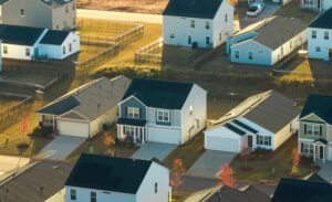 Aerial view of a modern suburban Florida residential neighborhood with single-family houses.